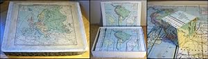 Landkarten-Puzzle aus Würfeln zum Zusammenlegen von Erdteilkarten.