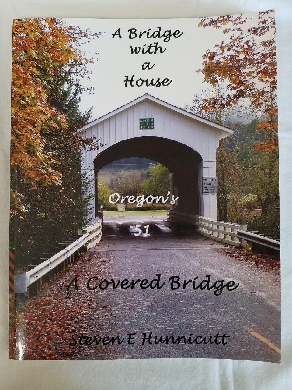 A Bridge With A House A Covered Bridge - 