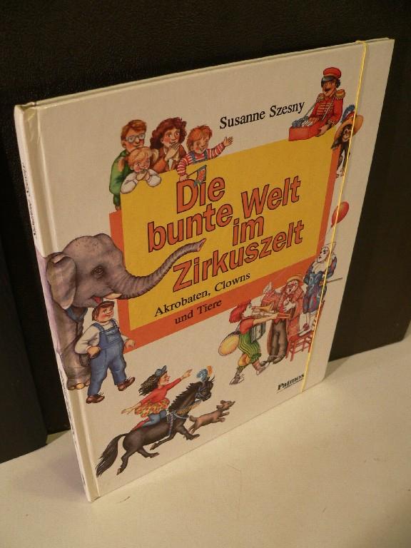 Die bunte Welt im Zirkuszelt. Akrobaten, Clowns und Tiere. - Schüren, Hermann-Josef und Susanne Szesny [Illustrationen]