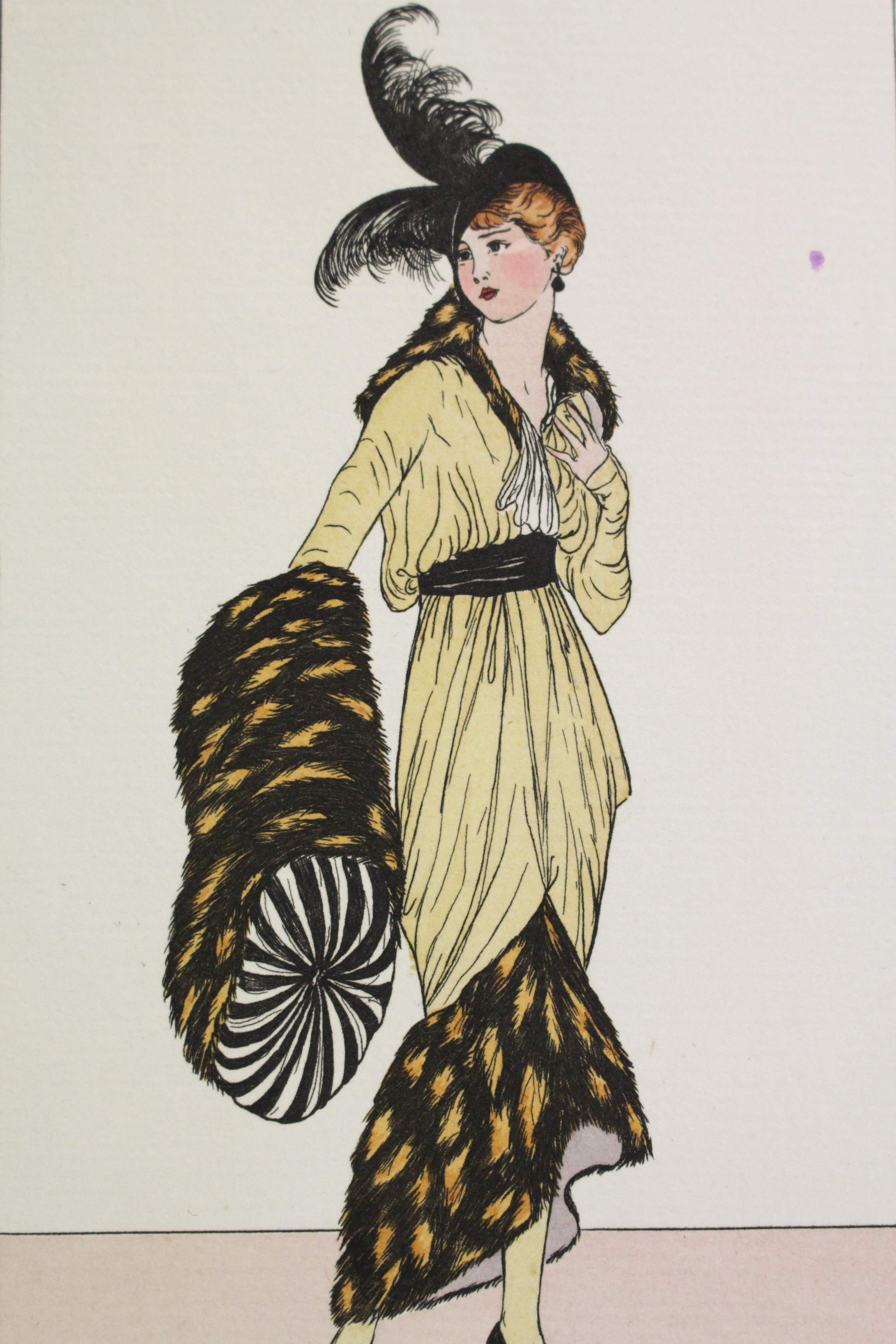 Costumes parisiens. Robe de satin topaze garnie de léopard. Manchon aussi de léopard (pl.110, Journal des Dames et des Modes, 1913 n°49) VAN BROCK Ja