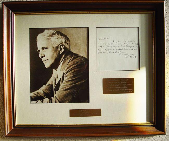 AUTOGRAPH LETTER SIGNED matted and framed with a portrait and two brass plaques FROST, Robert [ ]