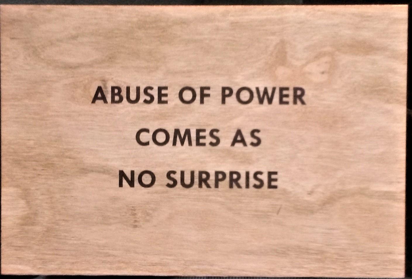 TRUISMS "Abuse of Power Comes As No Surprise" (new edition postcard on wood by Jenny Holzer