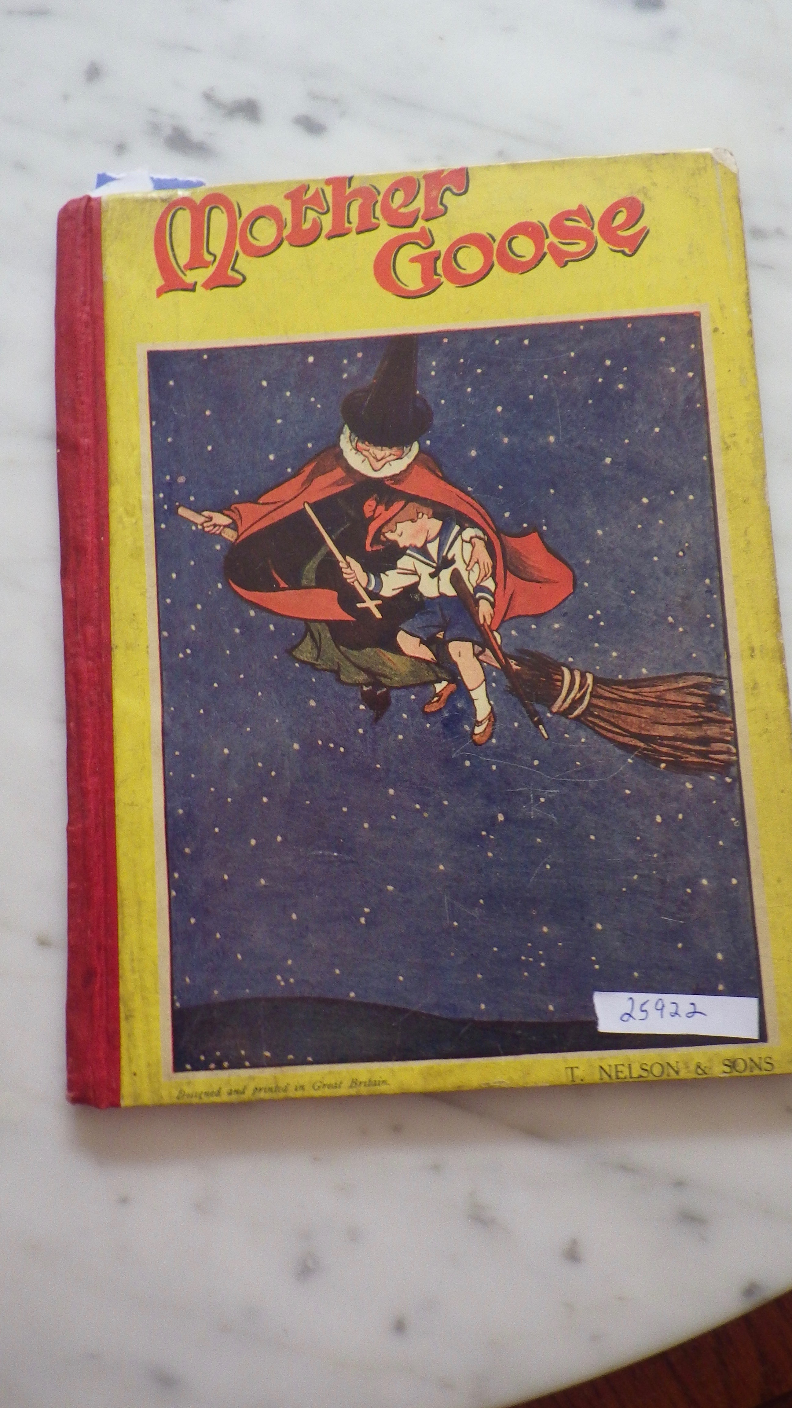 Mother Goose or Tommy in Fairyland, Decorative Boards with Witch In Green Dress & Red Cape & White Collar & Pointed Black Hat and Boy Sleeping Holdin
