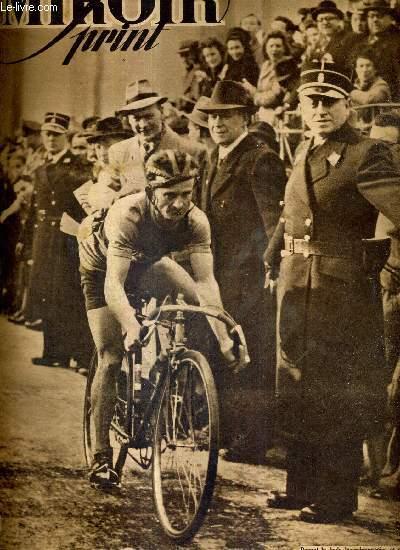 MIROIR SPRINT - N° 38 - 11 février 1947 / devant la foule luxembourgeoise et coiffé de son casque légendaire, le routier breton Jean Robic / champion