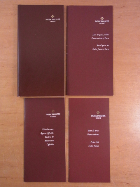 Patek Philippe Genf. Set von 4 Katalog-Broschüren im Schuber: 1. Die Kollektionen für Damen und Herren, Ausgabe 1997. 2. Price List Swiss francs 4/19