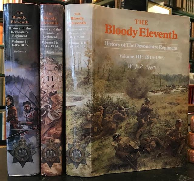 The Bloody Eleventh : History of The Devonshire Regiment. Volume I: 1685-1815. Volume II: 1815-1914. Volume III: 1914-1969. In three volumes - Robinson, R. E. R. and W. J. P. Aggett