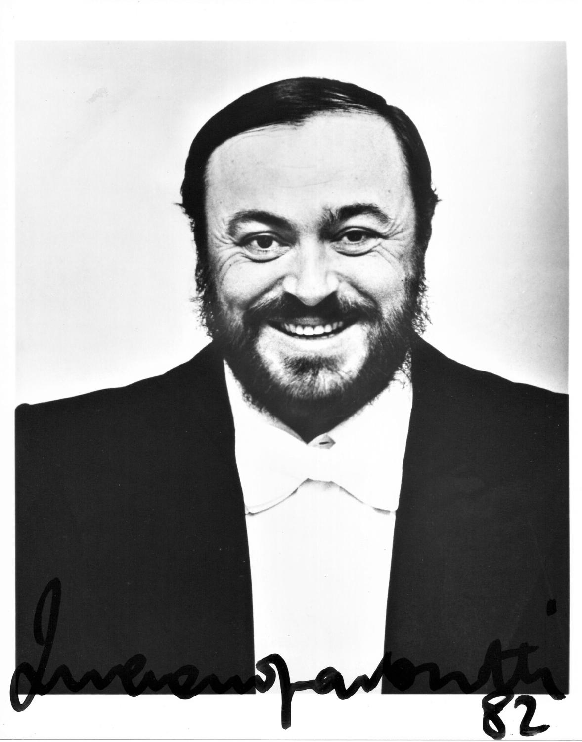AUTOGRAPHED PHOTOGRAPH OF LUCIANO PAVAROTTI Pavarotti, Luciano [Fine] [Softcover] Black and white photograph of Pavarotti boldly SIGNED by the famed singer in felt-tip pen. The signed photo was a premium given to some Lyric Opera  Friends  who donated during the 1982 Operathon. Accompanying the photo is a letter from the Operathon Committee explaining that the autographed photo was a substitute for a promised signed Pavarotti album, which was not available because the singer had cancelled his scheduled Chicago performance, as he was wont to do. Also included is the original envelope in which the photo was mailed. All 3 items are in excellent condition. Size: 10  X 8 