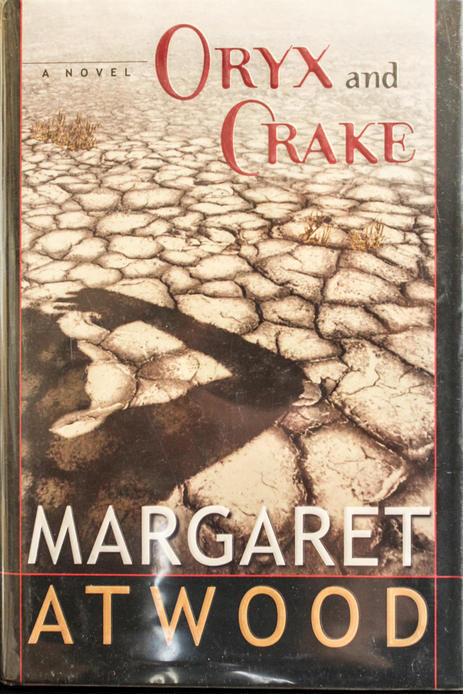 Oryx and Crake by Atwood, Margaret Very Good Hardcover (2003) 1st Edition Mad Hatter Bookstore