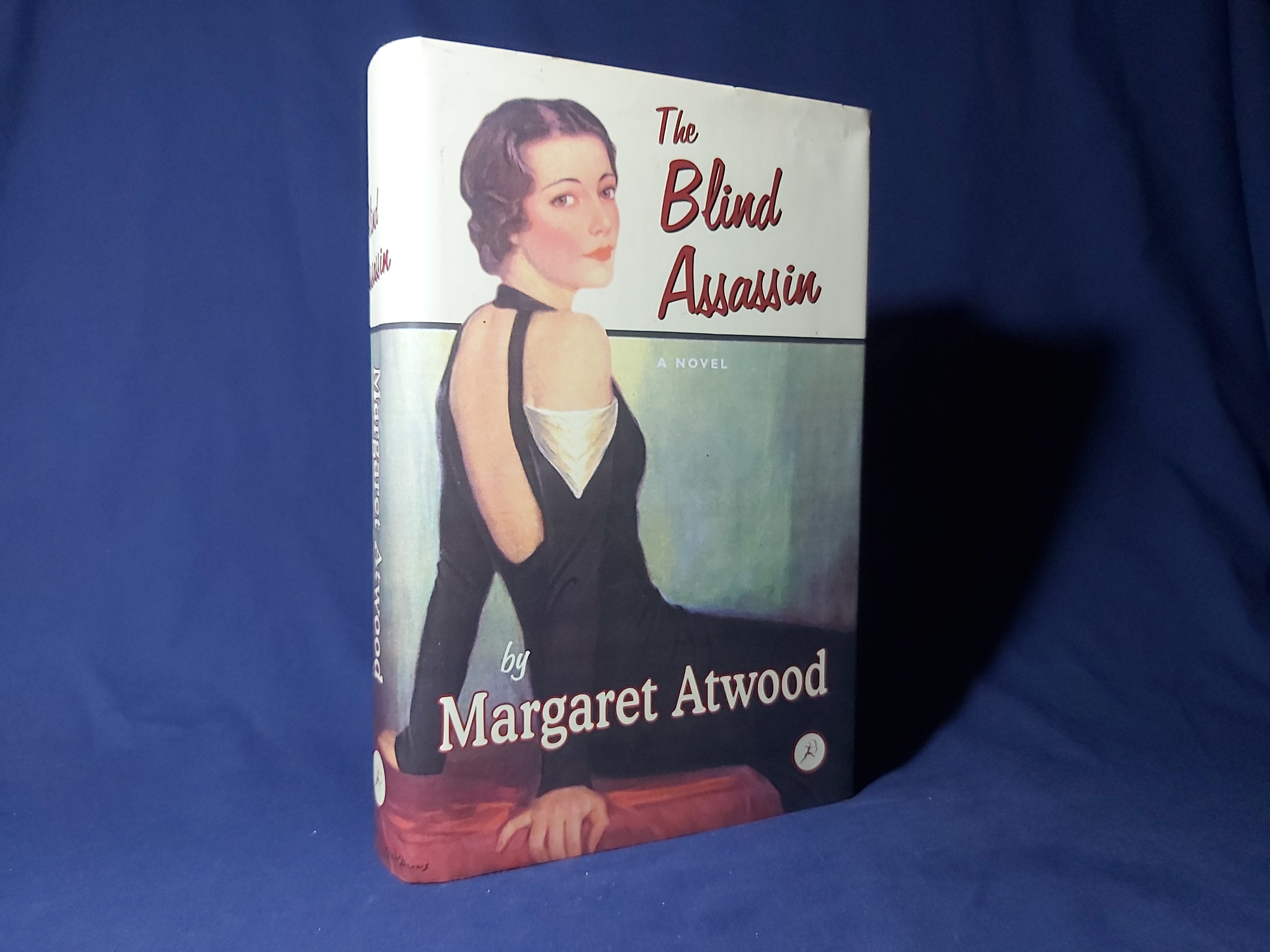 The Blind Assassin(Hardback,w/dust jacket,w/in built fabric bookmark