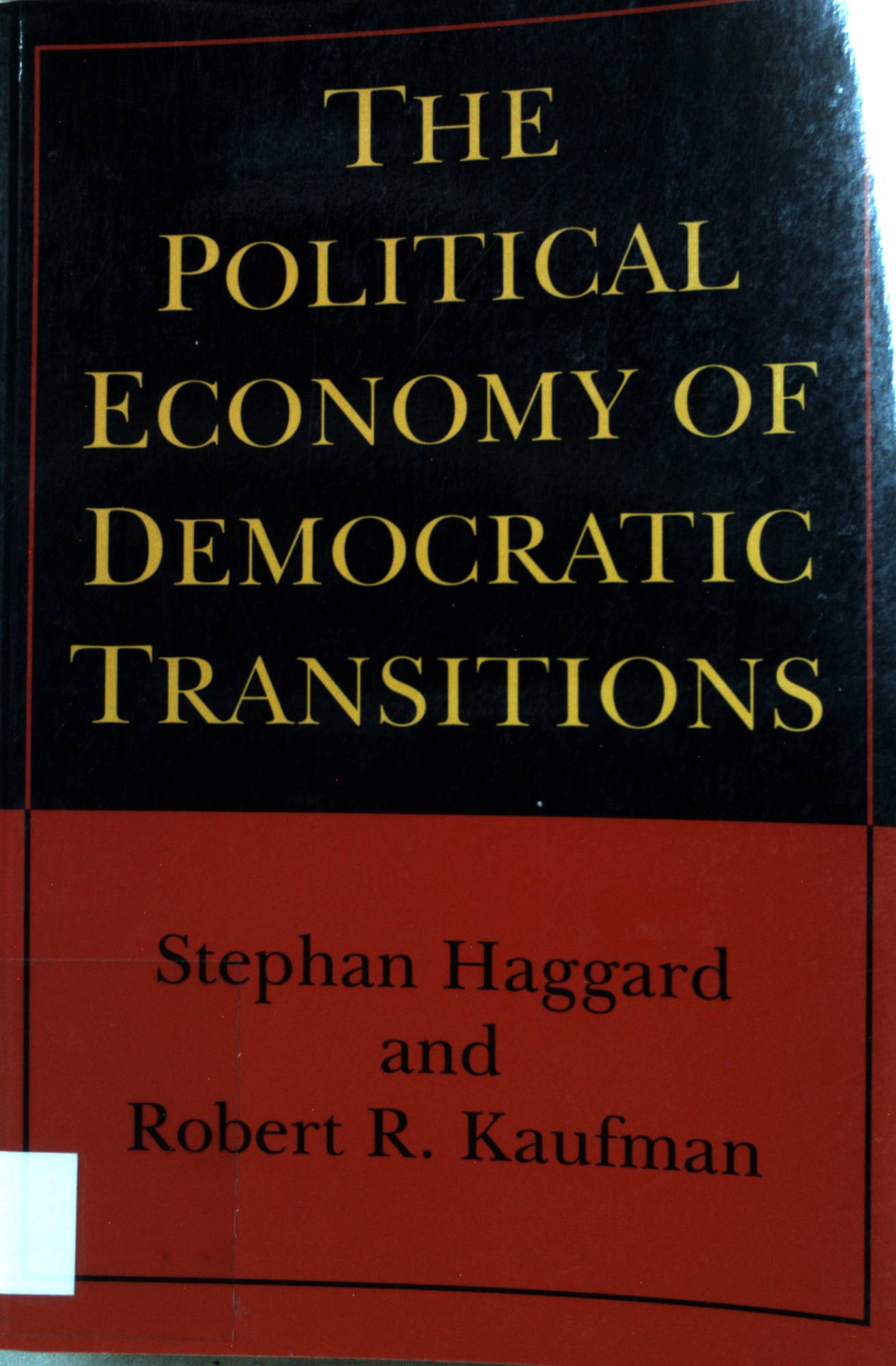 The Political Economy of Democratic Transitions. - Haggard, Stephan