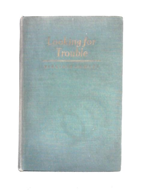 Looking for Trouble Virginia Cowles [Fair] [Hardcover] 1942. Reprinted. 469 pages. No dust jacket. Blue cloth. Pages are lightly tanned and foxed throughout. Occasional thumb-marking present. Cracking to front hinge with exposed binding. Previous owner's inscription to front free endpaper. Binding is shaky. Boards have moderate edge wear with bumping to corners and rubbing to surfaces. Crushing to spine ends with small splits and fraying to cloth. Scuffing and light marking overall. Mild tanning to spine and edges. Faint ring marking to front board. Book is slightly forward leaning.