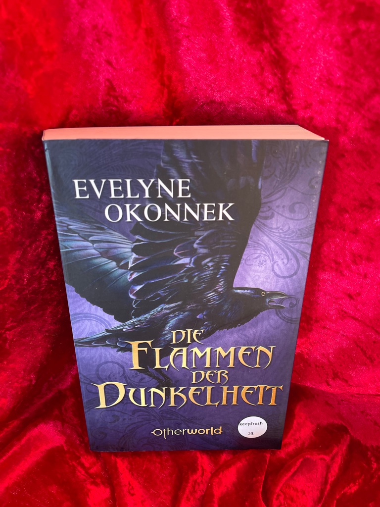 Die Flammen der Dunkelheit. - Okonnek, Evelyne