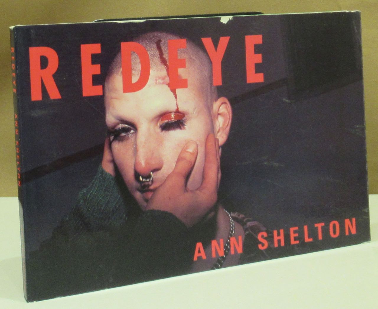 Redeye. Photographs. - Shelton, Ann.