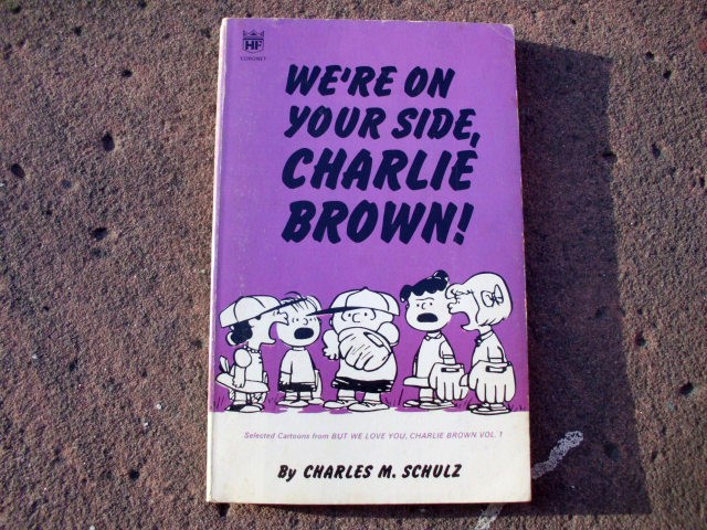We're on your side, Charlie Brown! Selected Cartoons from BUT WE LOVE YOU, CHARLIE BROWN. Vol. 1 (No 16). - Schulz, Charles M. [Monroe]