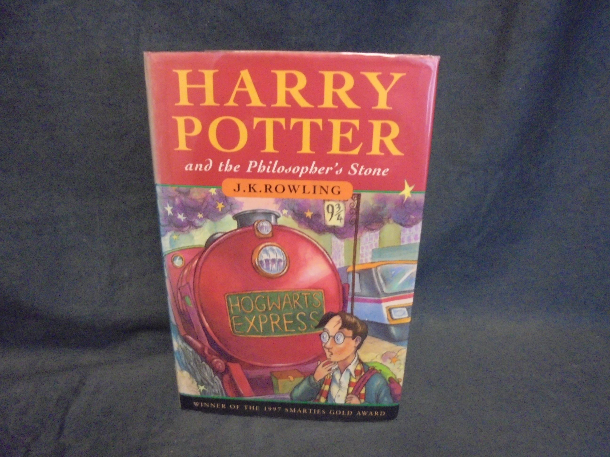 Harry Potter and the Philosopher's Stone by ROWLING J.K.:: (1951