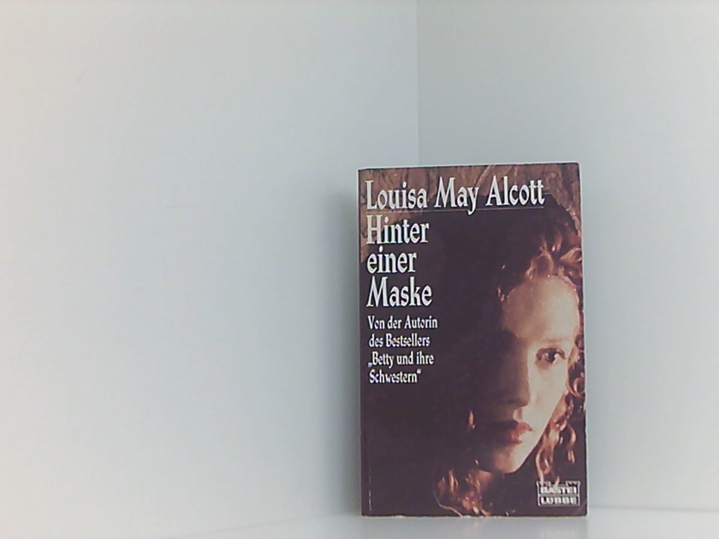 Hinter einer Maske (Allgemeine Reihe. Bastei Lübbe Taschenbücher) - Alcott Louisa, M