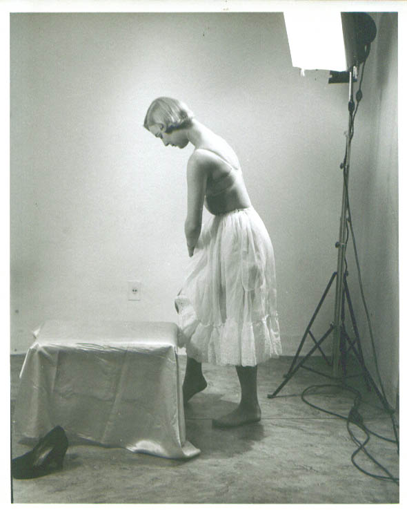 Blonde in bra adjusts half-slip vintage 8x10 1950s: Very Good No binding
