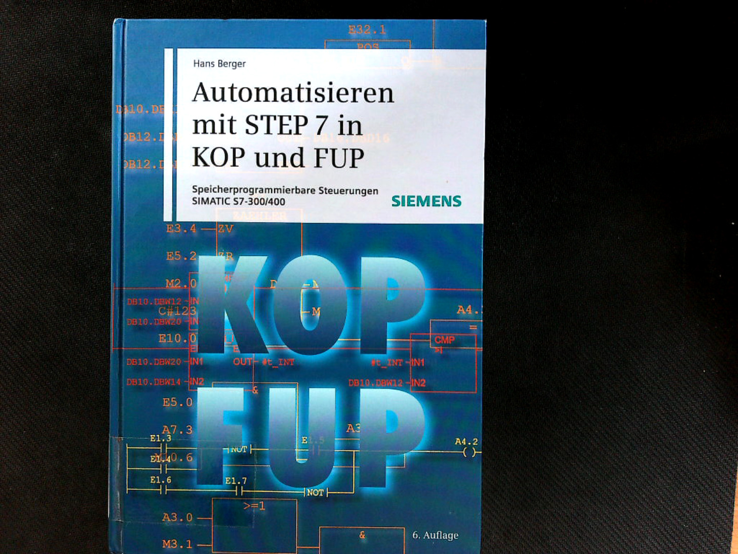 Automatisieren mit STEP 7 in KOP und FUP: Speicherprogrammierbare Steuerungen SIMATIC S7-300/400. - Berger, Hans