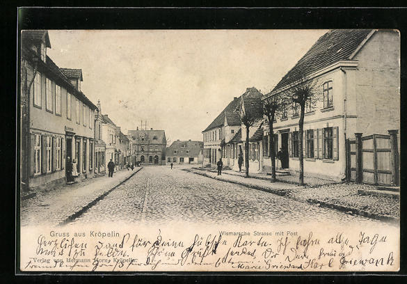 Ansichtskarte Kröpelin, Wismarsche Strasse mit Post (1904) Manuscript