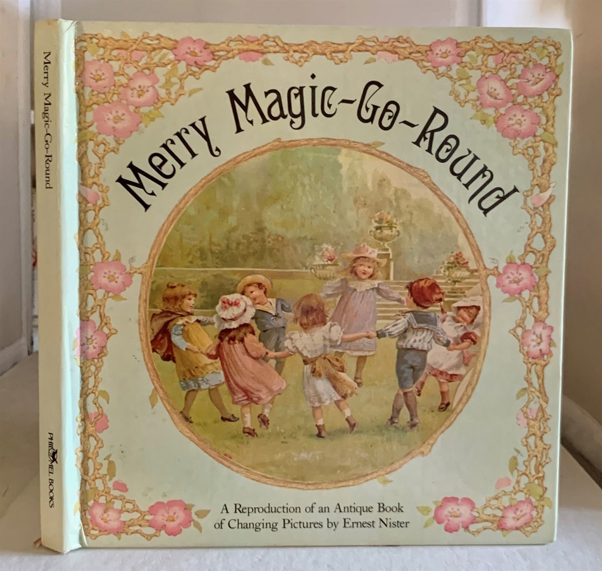 Merry Magic-go-round A Reproduction of an Antique Book of Changing Pictures - Nister, Ernest