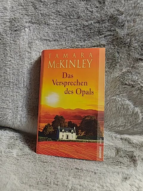 Das Versprechen des Opals : Roman. Aus dem austral. Engl. von Rainer Schmidt / Weltbild-Reader - McKinley, Tamara