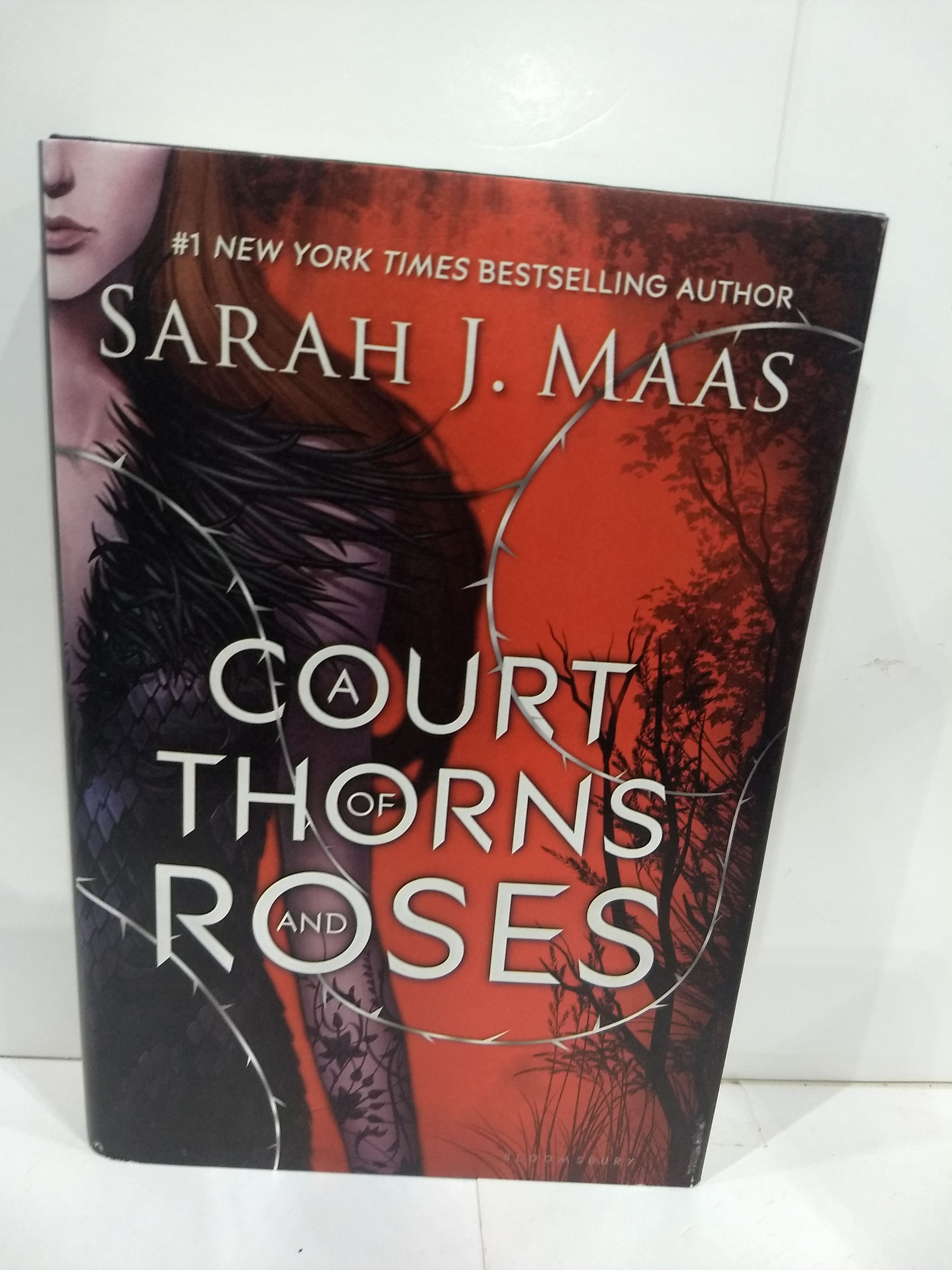 A Court of Thorns and Roses (A Court of Thorns and Roses, 1) by Sarah J. Maas Used; Very Good