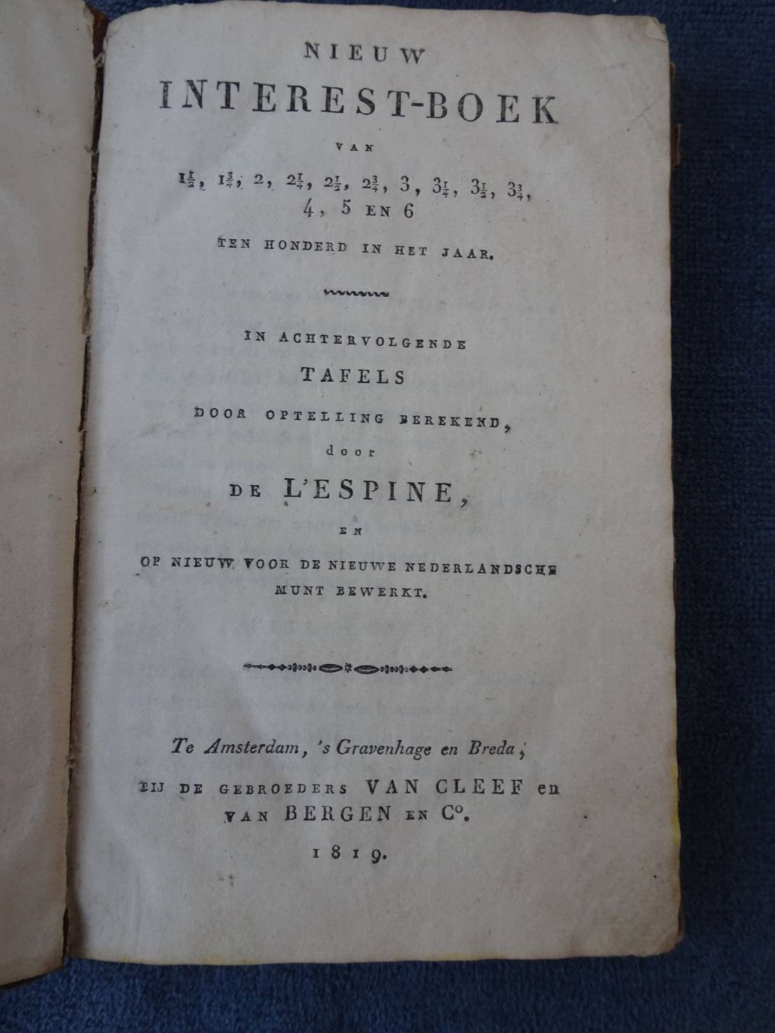 Nieuw Interest-boek, ten honderd in het jaar. In achtervolgende tafels door optelling berekend, door de l'Espine, en op nieuw voor de nieuwe Nederlan