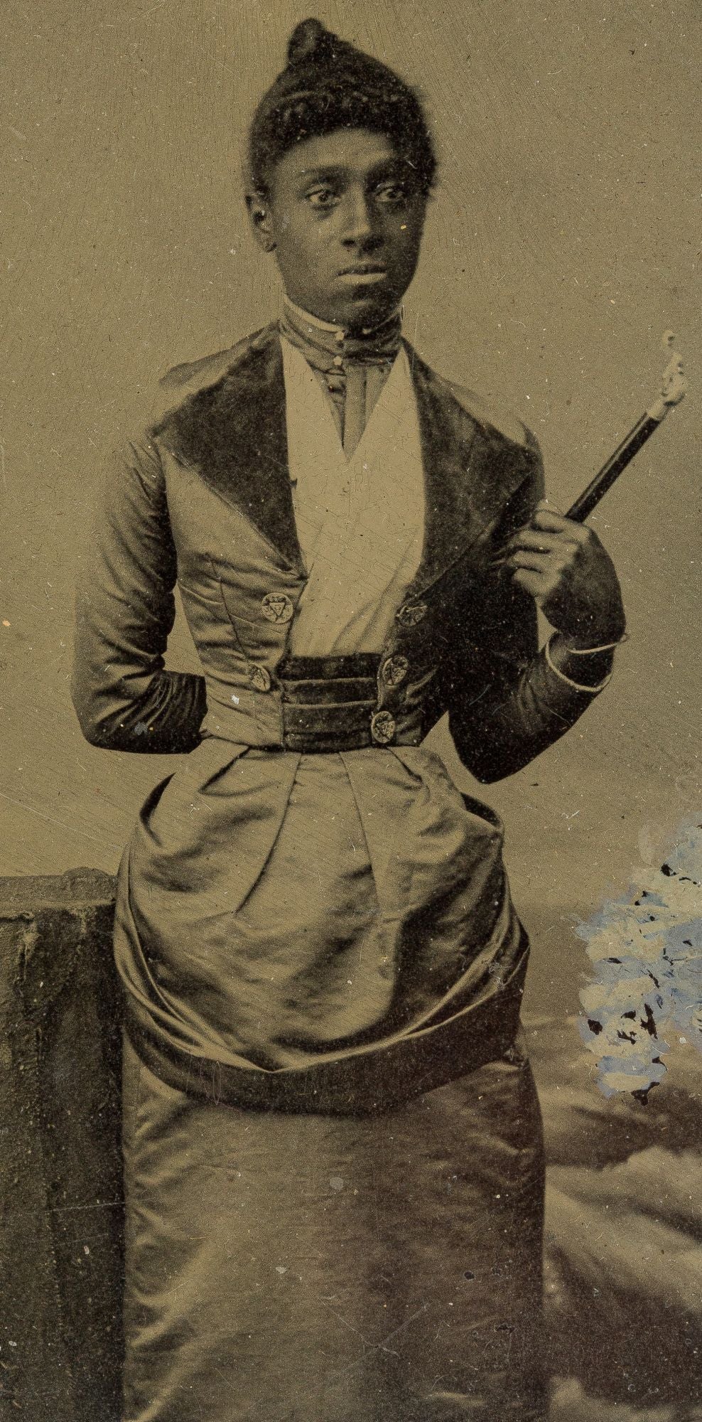 [Ambrotype]: African-American Woman with a cane or baton. Circa 1855 [Assez bon]