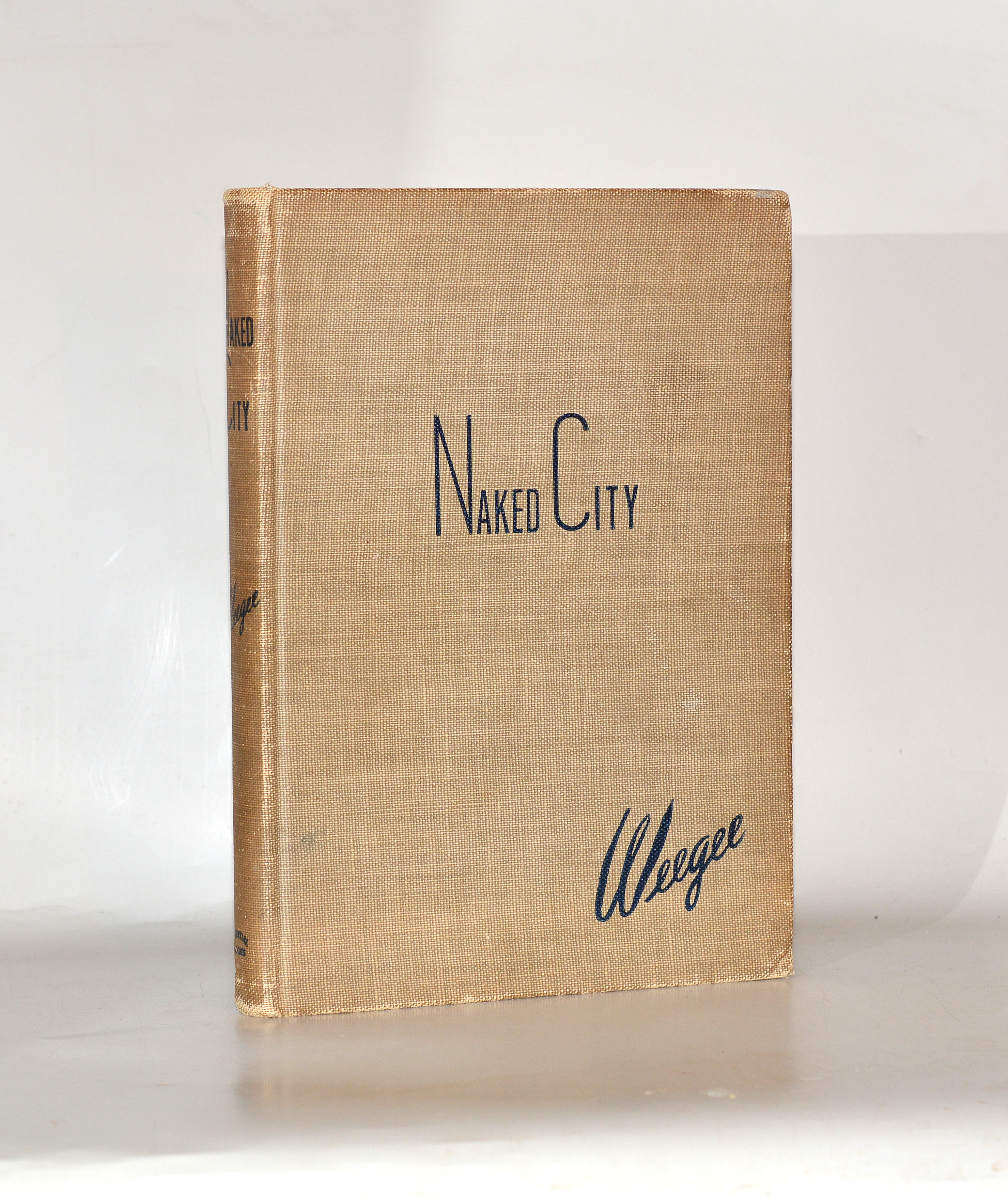 NAKED CITY. by WEEGEE (Arthur Fellig).: (1945) Signed by Author(s