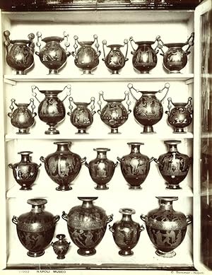 Bild des Verkufers fr [Display Cabinet With Vases]. zum Verkauf von Shapero Rare Books