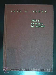 Seller image for Vida y fantasa de Azorn. Jos S. Serna. Albacete 1965. 166 pp. ilustradas con 9 lminas de G. Prieto, A. Mateos, A. Tendero, etc. Tamao octava mayor apaisada. Tapa dura forrada en tela roja. Discretas seales de antigedad y uso: ligera decoloracin en cubiertas ocasionada por antiguo tejuelo, en interior conserva 3 signaturas. Sin sobrecubiertas. Ejemplar raro. Precio especial por mencionados defectos, pues su precio ronda los 50,00? for sale by Librera Anticuaria Ftima