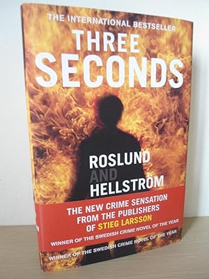 Three Seconds- SIGNED & LINED- UK 1st Ed 1st Print hardback with belly band