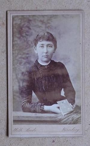 Seller image for Carte De Visite Photograph: Portrait of a Young Woman Holding a Book. for sale by N. G. Lawrie Books