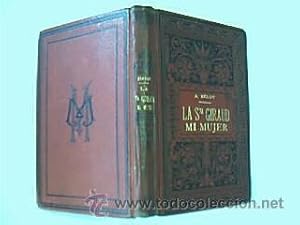 Imagen del vendedor de La seorita Giraud, mi mujer. Belot, Adolfo. Traduccin M. Carreau. Barcelona Editorial Maucci. 1899. 206 pp. + 14 de Catlogo obras editorial. Tamao octava mayor. Cubiertas originales en tapa dura muy bellamente ornamentadas en barroco con estampaciones y ornamentos negros y dorados. Buen estado, aparentando muy dignamente su edad. a la venta por Librera Anticuaria Ftima