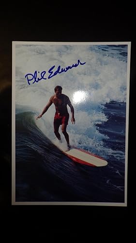 Immagine del venditore per PHIL EDWARDS on Red & White Surfboard & red Swim Trunks in Ocean, Personally SIGNED PHOTO IN BLUE INK 5 x 7 SURFING legend surf ,COA,CERTIFICATE OF AUTHENTICITY , SIGNED PHOTO OF SURFER, venduto da Bluff Park Rare Books
