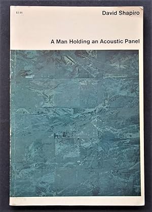 A Man Holding an Acoustic Panel