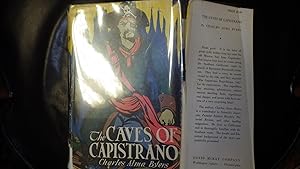 Seller image for Caves of Capistrano, The, a Tale of Hidden Treasure Along the Southern California Coast. In RARE Vintage Color Dustjacket Depicting a Handsome One-eyed Stevensonesque PIRATE WITH Crossbones & Skeleton on His Black Hat & Red Sash at His Waist Holding a Gun for sale by Bluff Park Rare Books