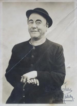 Signed photograph with an autograph self-portrait caricature signed on the verso, c1925