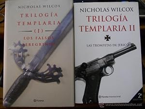 Imagen del vendedor de Contiene 2 volmenes: TRILOGA TEMPLARIA I, Los falsos peregrinos y TRILOGA TEMPLARIA II, Las trompetas de Jeric. Nicholas Wilcox. Editorial Planeta S.A. 2000 y 2002. Internacional. ISBN: 84-08-03441-3 y 84-08-04416-8 respectivamente. Tamao cuarta. El Volumen I tiene tapa dura color negro con caracteres dorados en lomo y sobrecubiertas ilustrada original y el volumen II es rustica ilustrada original con solapas. Firma del anterior poseedor en ambos libros en portadilla. Estado: Escasas seales de uso. a la venta por Librera Anticuaria Ftima