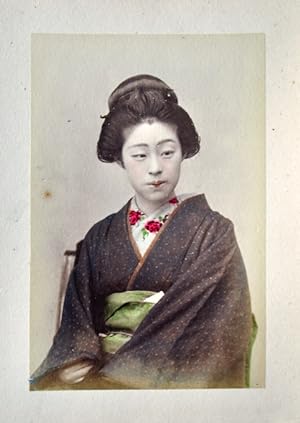 [A Japanese lacquer album with 50 hand coloured photographs. Ca 1880's].
