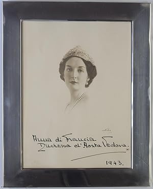 Bild des Verkufers fr Splendid Signed and Dated Portrait Photograph, (Anna, 1906-1986, daughter of Prince Jean, Duc de Guise, Head of the Royal House of France, and wife, 1927, of her first cousin Amedeo, 3rd Duke of Aosta, 1898-1942, Governor-General of Italian East Africa and Viceroy of Abyssinia, 1937-1941) zum Verkauf von Sophie Dupre  ABA ILAB PADA