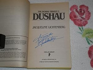 Seller image for Dushau: Signed for sale by SkylarkerBooks