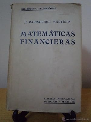 Imagen del vendedor de MATEMTICAS FINANCIERAS. Soluciones de Aritmtica y lgebra. ZARRALUQUI MARTNEZ, J. Biblioteca Tecnolgica. Librera Internacional de Romo, Madrid, 1944. 847 pginas Tamao 218x152mm. Tapa dura original con lomo en tela color gris con caracteres en negro. Sobrecubiertas originales. Corte superior color granate. Uso normal. Sobrecubiertas con lomo tostado, cuarteamientos y pequeas roturas. Presencia de xido en reverso cubiertas y guardas debido al tipo de papel de las mismas y su antigedad. a la venta por Librera Anticuaria Ftima