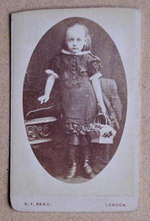 Seller image for Carte De Visite Photograph: Portrait of a Young Girl Holding a Basket. for sale by N. G. Lawrie Books