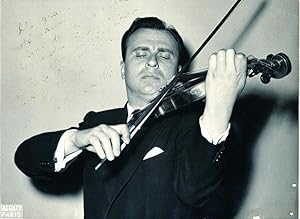 Portrait of violinist Henryk Szeryng (1918-1988), inscribed, signed and dated 1956