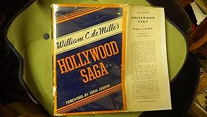 Seller image for Hollywood Saga in RARE Color DustJacket of Blue, White & Orange ,A Solid Copy of a Rare Book, William C. DeMilles , he Left Broadway and Went to Hollywood for 3 Months - he Stayed for 20 Years. He Tells About the Early Days of Hollywood from First-hand for sale by Bluff Park Rare Books