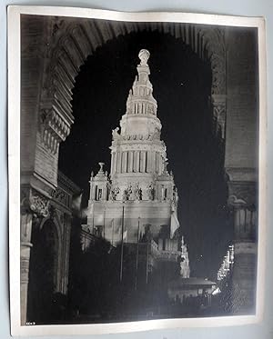 Tower of Jewels at night viewed through an arch. Building. Original photo Pan Pacific Internation...