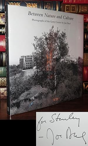 Image du vendeur pour BETWEEN NATURE AND CULTURE Photographs of the Getty Center by Joe Deal mis en vente par Rare Book Cellar