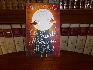 Image du vendeur pour The Earth Hums in B Flat: MINT SIGNED, LINED & PUBLICATION DAY DATED FIRST EDITION mis en vente par Welcombe Books