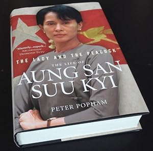 Image du vendeur pour The Lady And The Peacock: The Life of Aung San Suu Kyi of Burma mis en vente par Denton Island Books